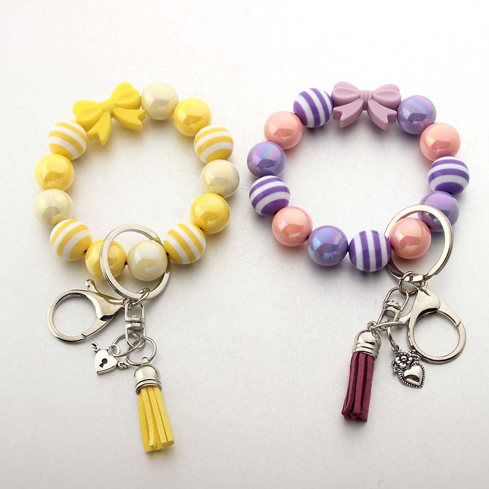 Wholesale Tassel Dragonfly Bull Head Lion Love Angel Acrylic Wrist Keychain